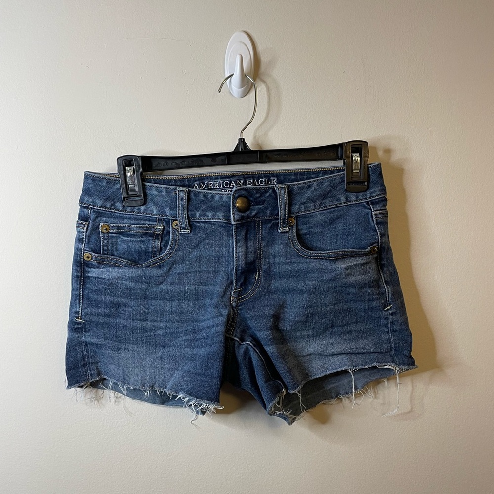 American Eagle Medium Wash Raw Hem Cutoff Super Stretch Shortie Denim Shorts